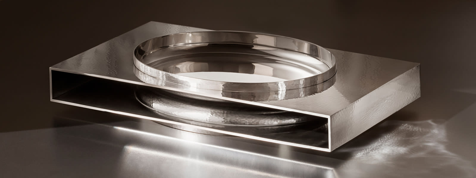 Penumbra hand crafted in sterling silver by Georg Jensen silversmiths and designed by David Thulstrup.