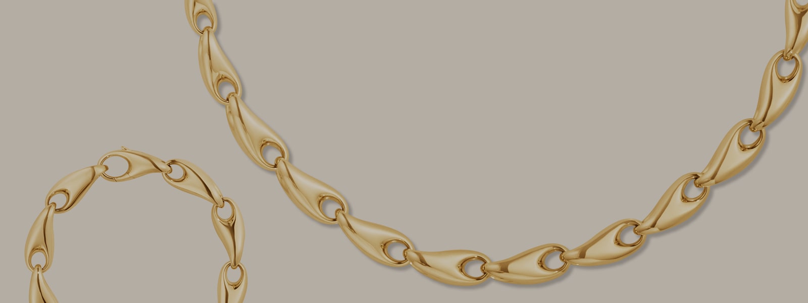 Necklace and bracelet in 18 kt yellow gold from the Reflect collection designed by Jacqueline Rabun