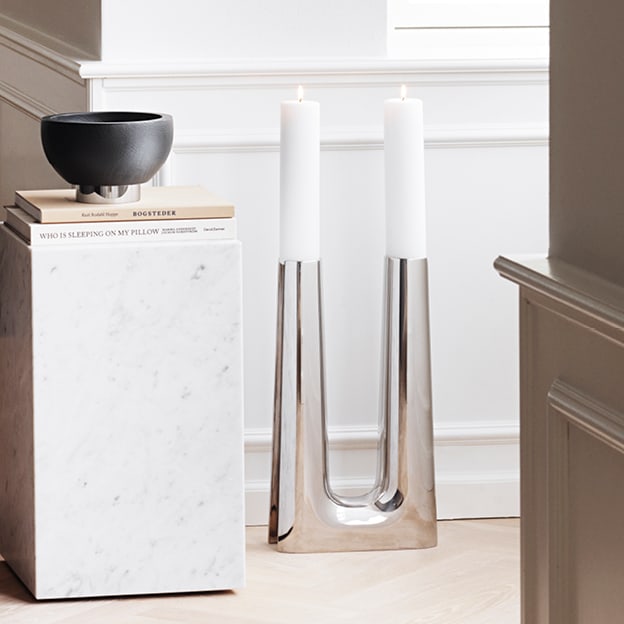 Mirror polished stainless steel floor candle holder from the Copenhagen collection