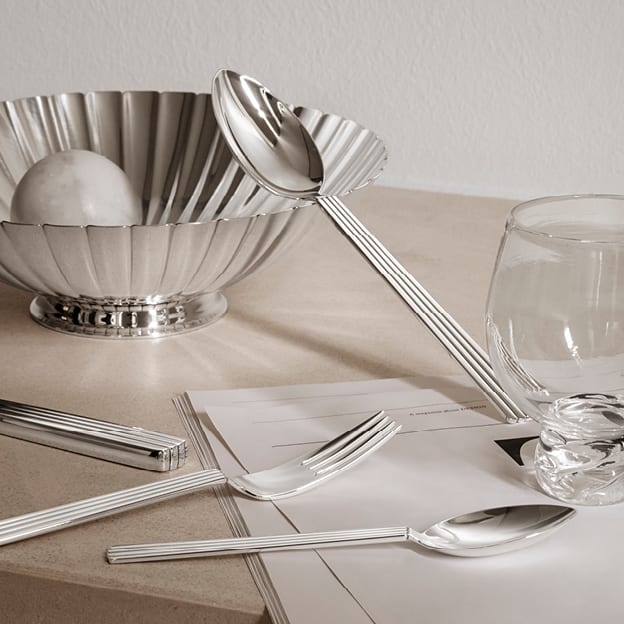 Cutlery and bowl in sterling silver designed by Sigvard Bernadotte