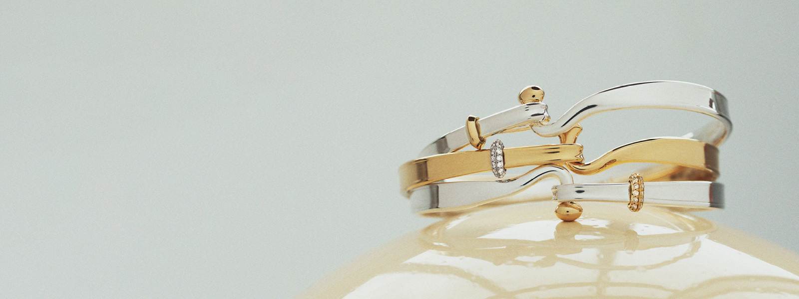 Bracelets in sterling silver, 18 kt gold and diamonds from Torun Collection