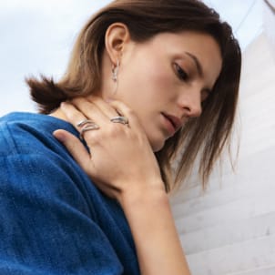 Mercy jewellery in silver seen on model - Georg Jensen