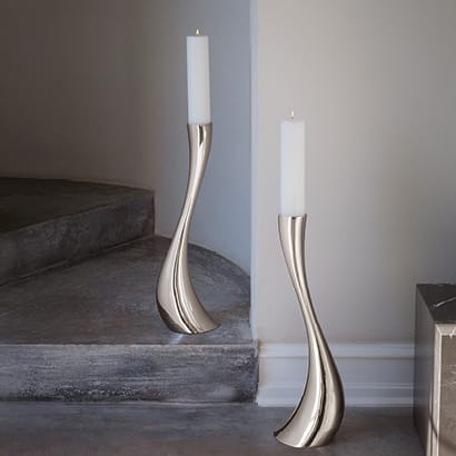 The Cobra candle holder Collection in polished stainless steel size small medium and large