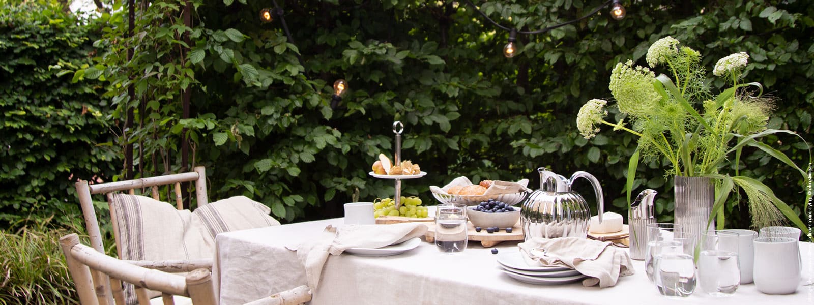 Outdoor table setting with dining items from Georg Jensen