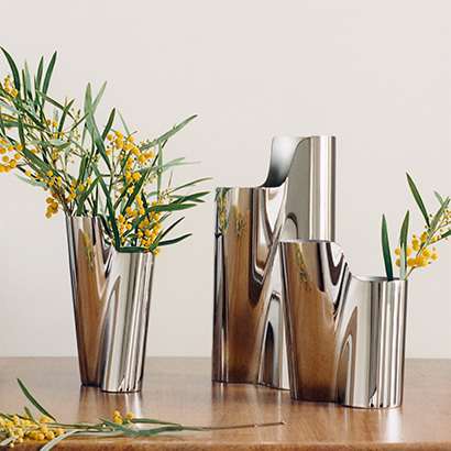 vases in stainless steel from the lituus collection designed for georg jensen