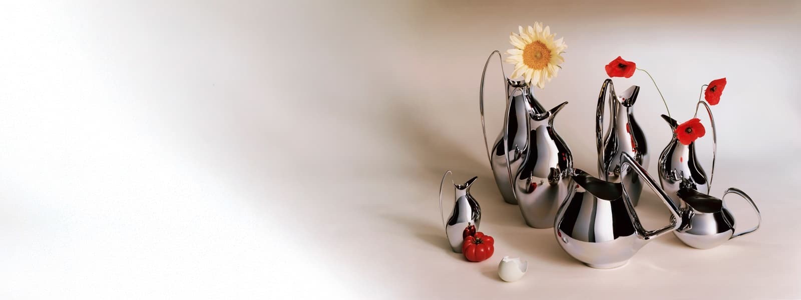 Georg Jensen koppel pitchers in sterling silver