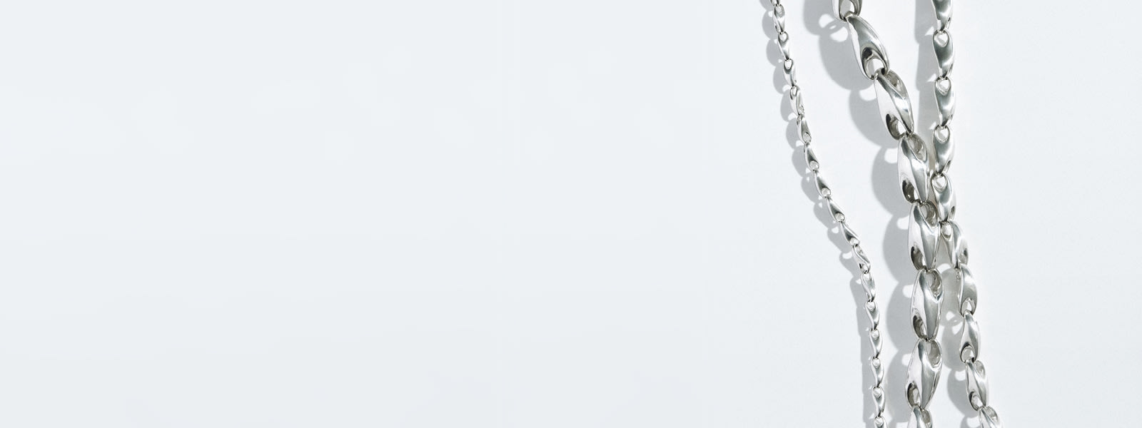 Explore bracelets, rings, and necklaces in sterling silver designed by Jacqueline Rabun from the Reflect collection