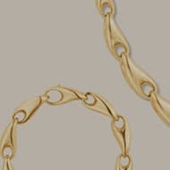 Ring and bracelet in 18kt recycled gold from the Reflect collection designed by Jacqueline Rabun