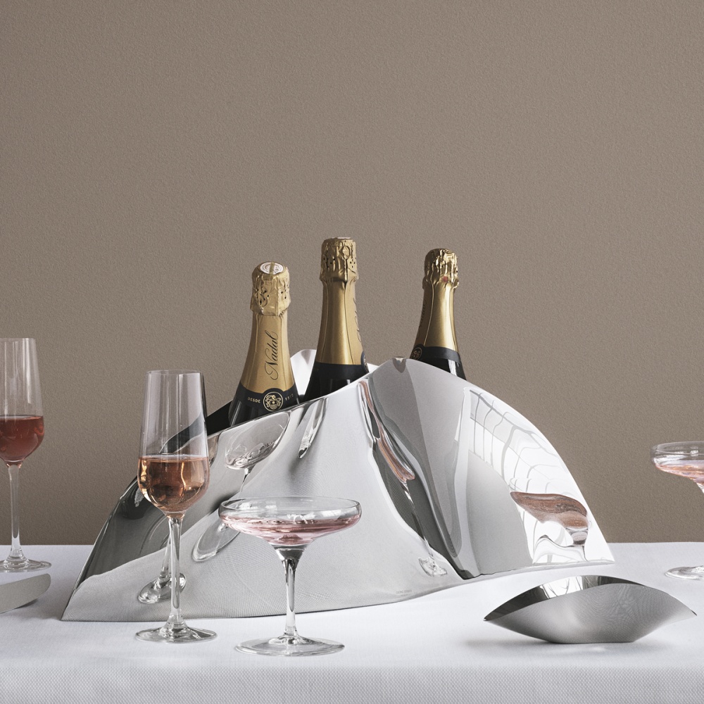 Bottle of Champagne in Holder with 2 Filled Glasses on A Silver Tray