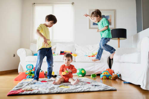 Children playing in living room