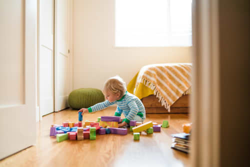 toddler playing with blocks