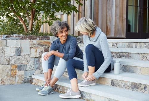 women on steps