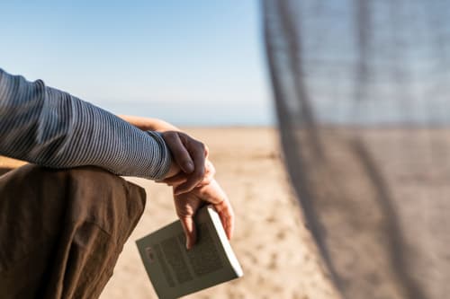 man holding book