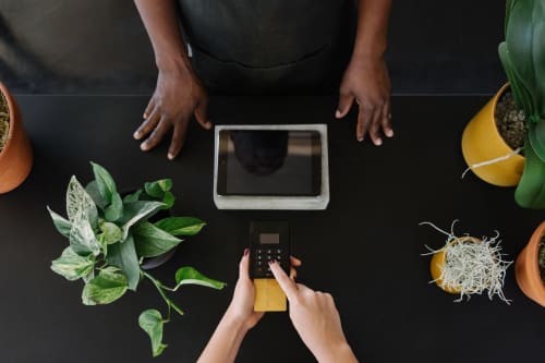 person paying with credit card