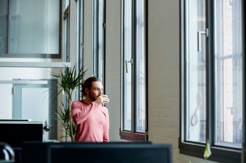 man drinking coffee