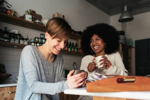 women sharing coffee