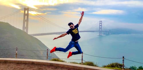 jumping in front of the Golden Gate bridge