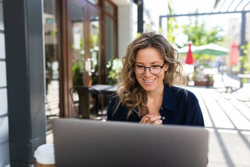 woman sitting with computer