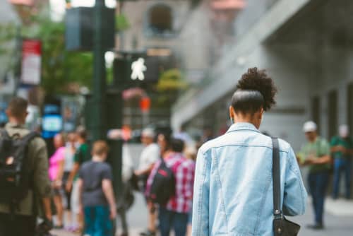 woman walking down street