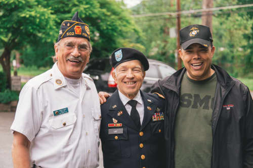 veterans posing for photo together