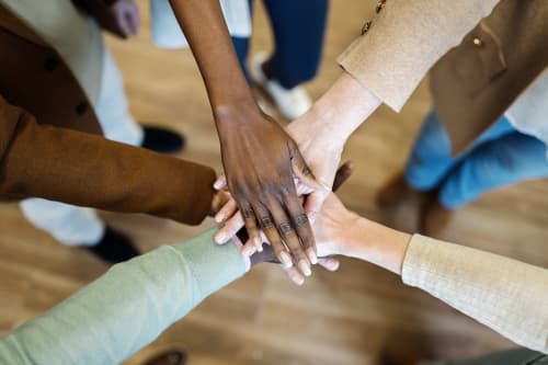 women holding hands