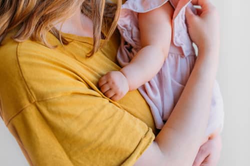 woman holding baby