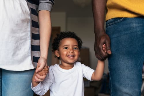 Happy Family Having Fun In Home