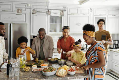 large family celebration in the kitchen