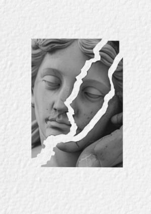 Image of broken up statues face