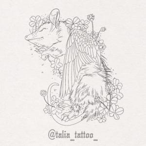 Image of Opossum in clover