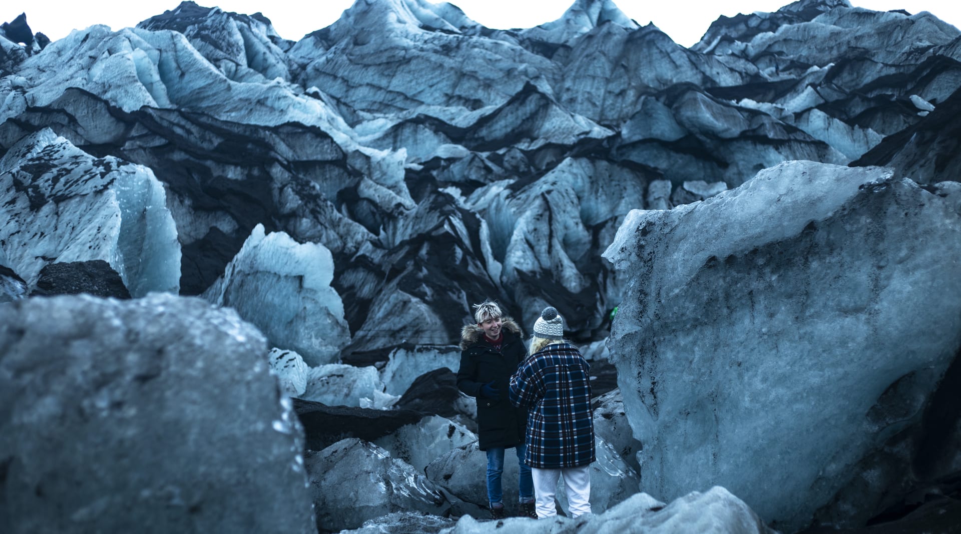 Having a laugh amongst the elements at Seljalandsfoss waterfall Iceland