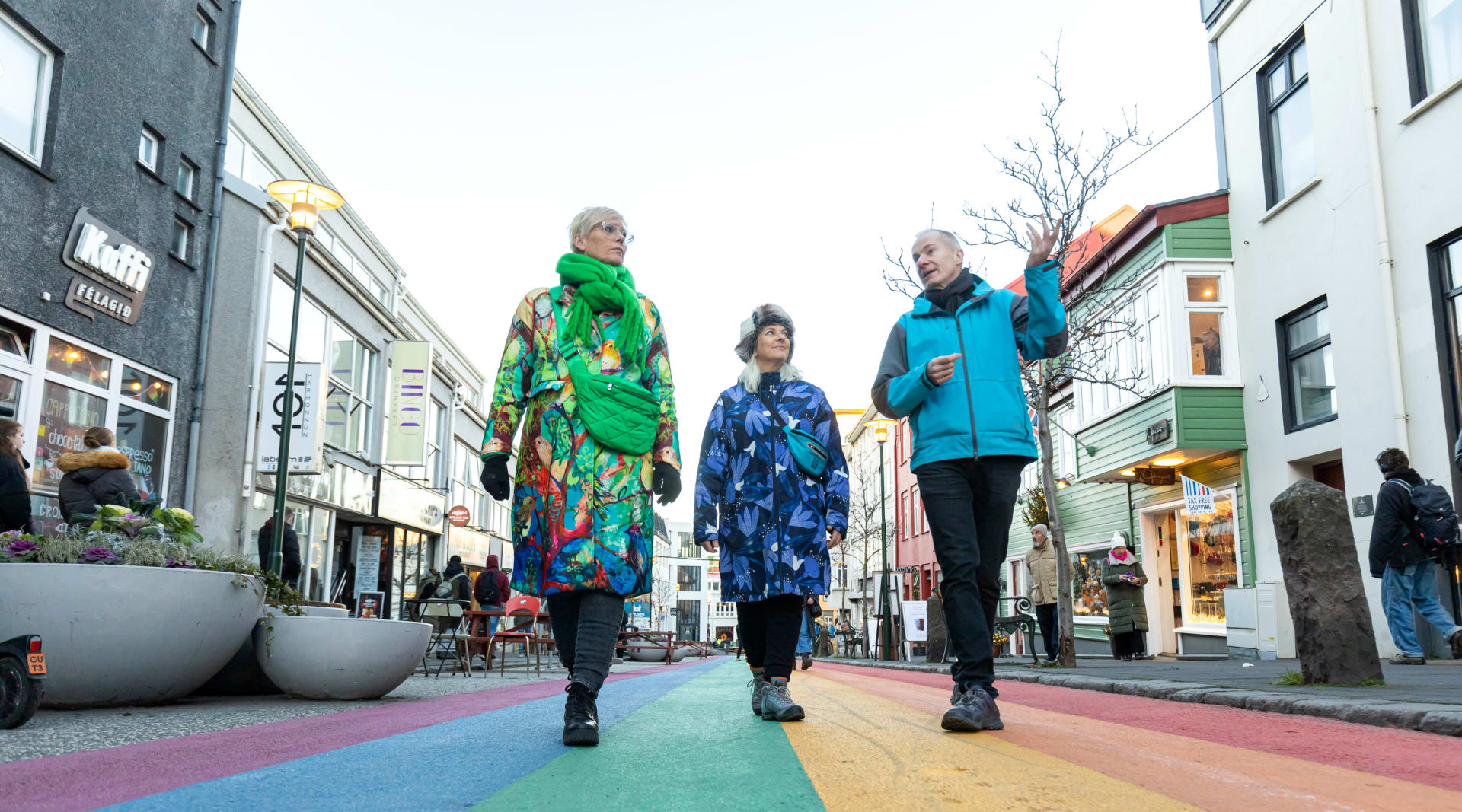 A group of guests enjoying the cozy atmosphere of Reykjavik while listening to our Guide 