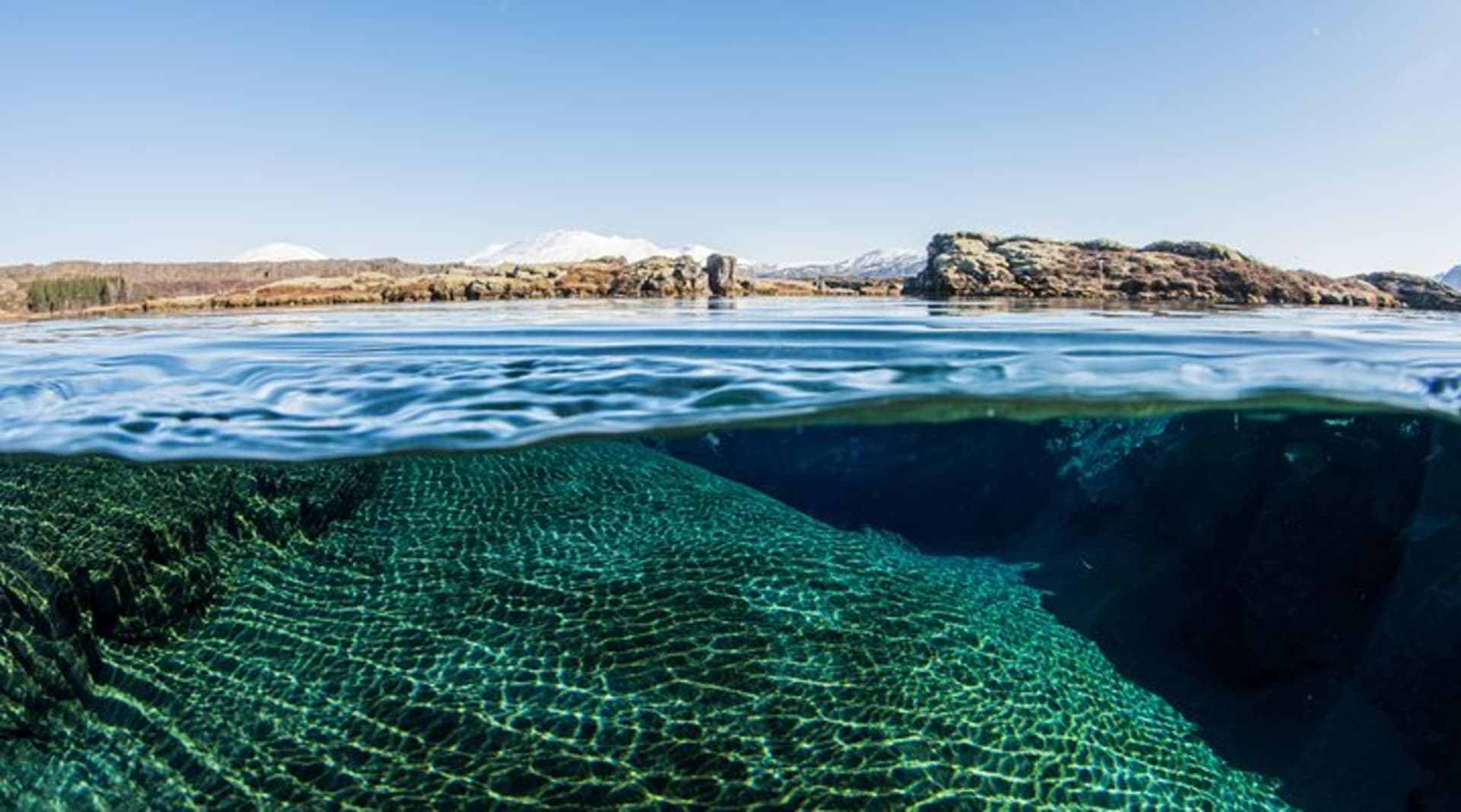 The view above and below in Silfra lagoon