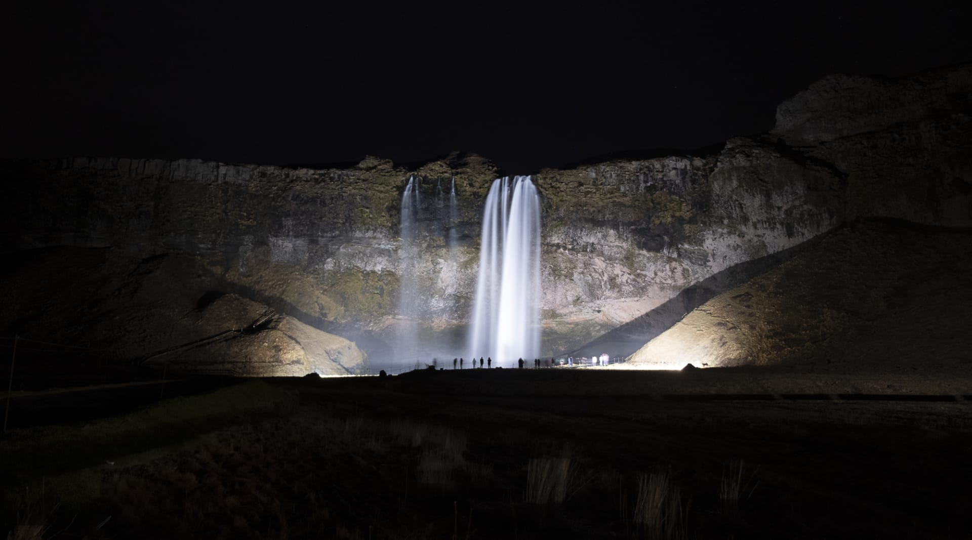 Seljalandsfoss waterfall showing off after dark