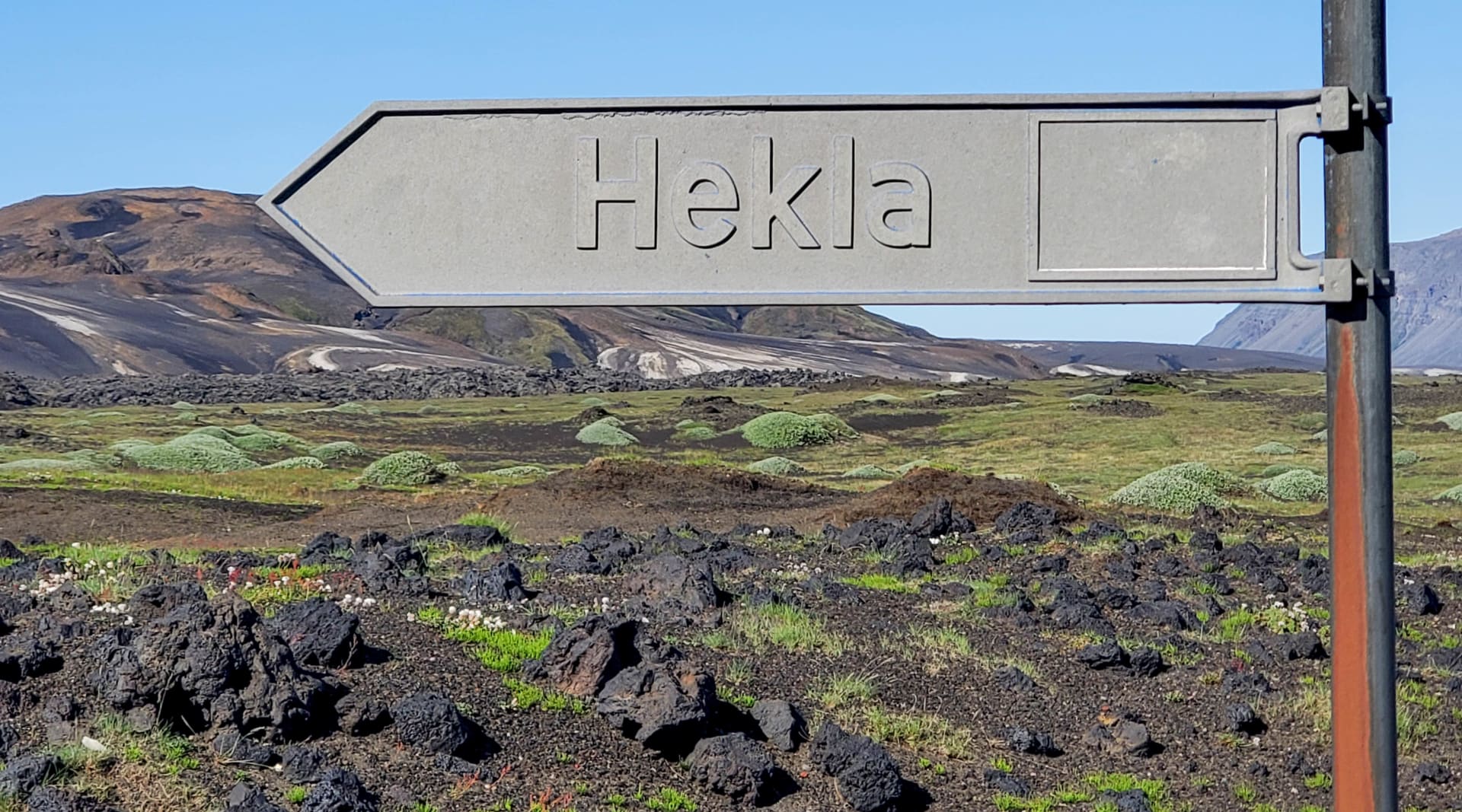 Sandblasted sign to the Road to Hekla 