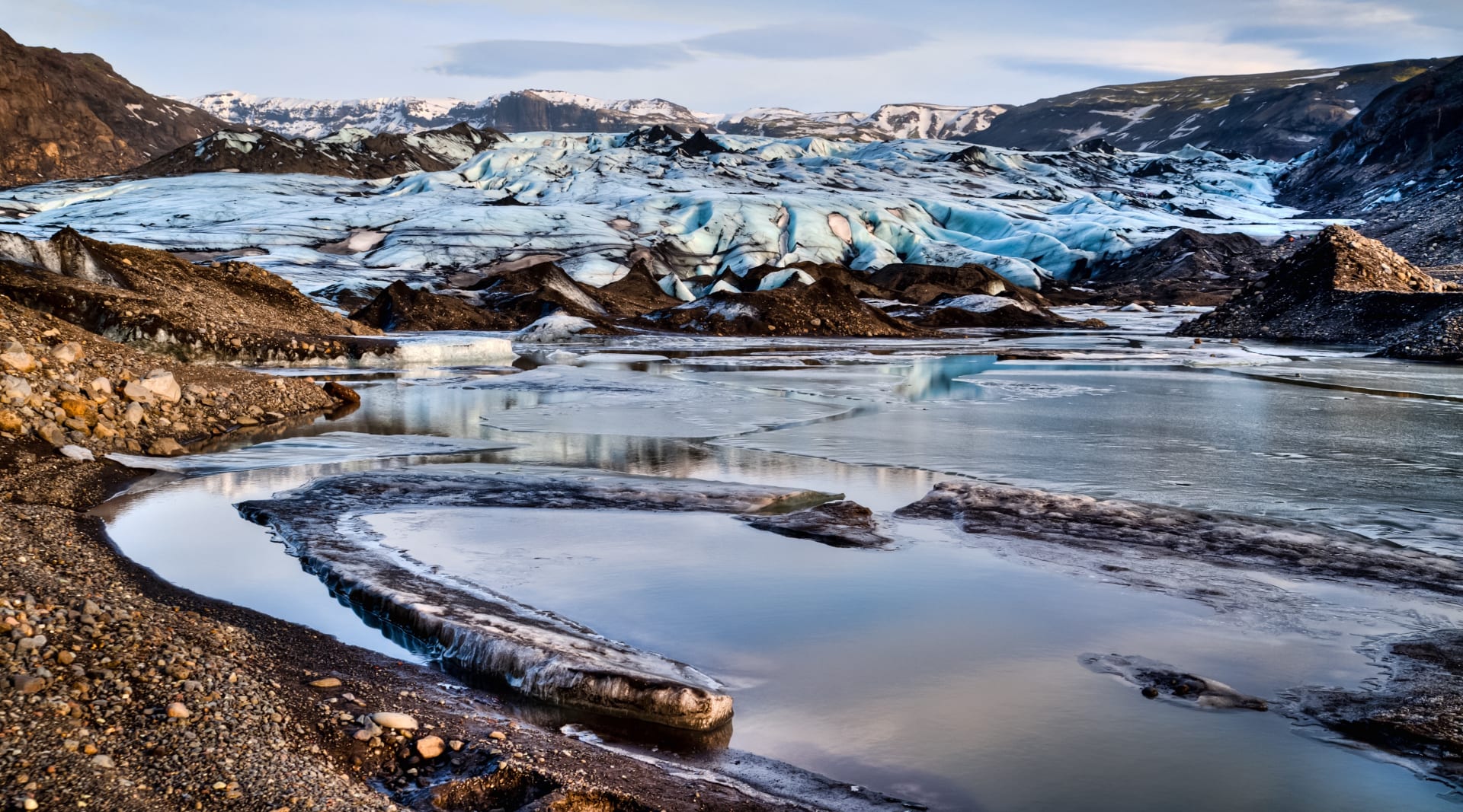 Glacier with water and sand lagoon