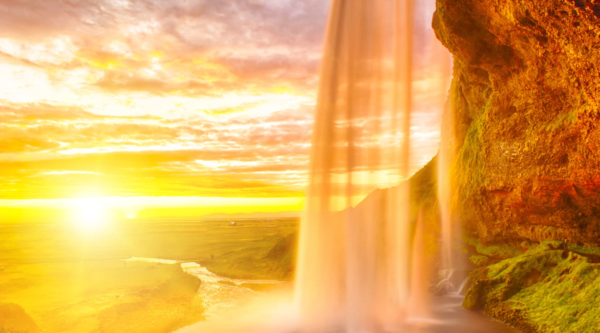 Seljalandsfoss on the South Coast in Iceland. Midnight sun.