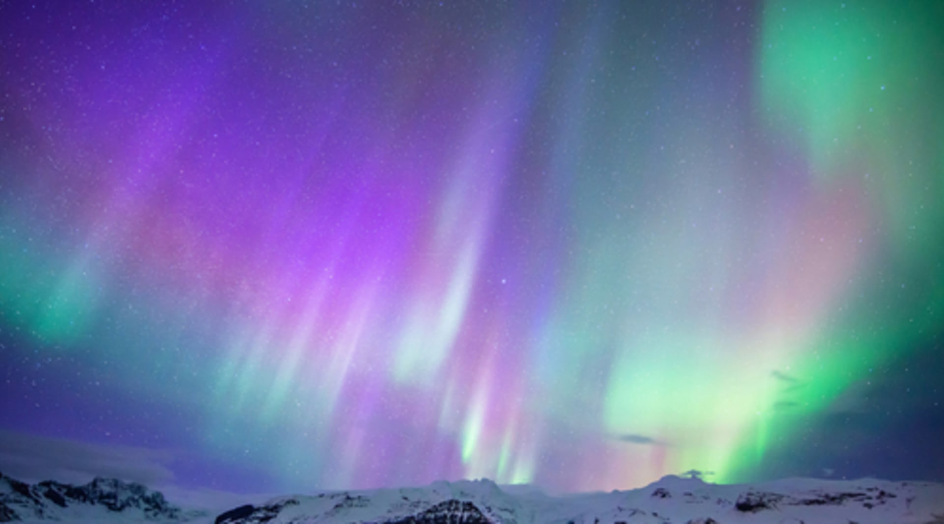 Northern Lights over Mountain in Iceland