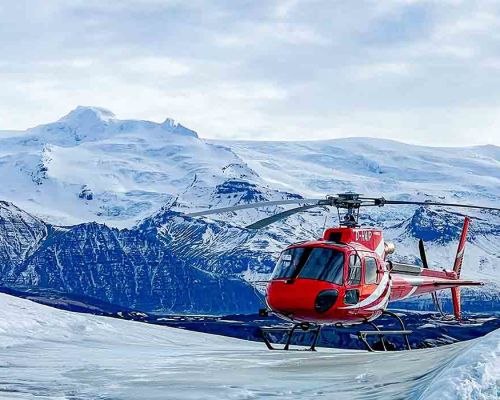 Airbus H125 helicopter landing at glacier