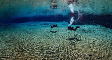 Thumbnail about Divers in the Silfra Lagoon