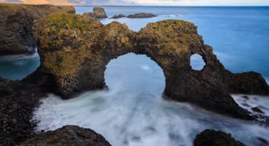 Thumbnail about Beautiful rock formations looking like a petrified baby elephant drinking