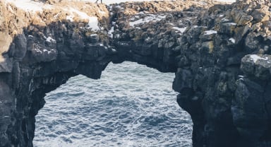 Thumbnail about Walking on the edge at Arnarstapi Iceland