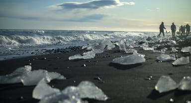 Thumbnail about Walking in-between ice at Diamond Beach