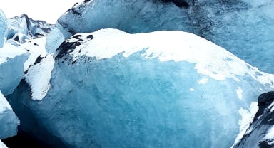 Thumbnail about Beautiful blue ice at Sólheimajökull glacier