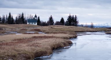 Thumbnail about Thingvellir church in fall along the öxara river