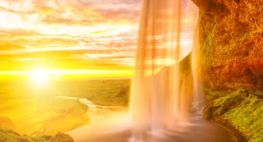 Thumbnail about Seljalandsfoss on the South Coast in Iceland. Midnight sun.