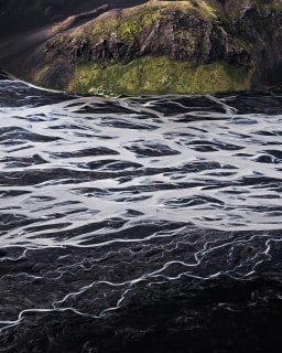Cover image for the Black Sands and Riverbeds Airplane Tours experience