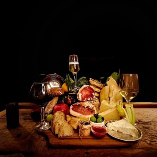 Cover image for the ROME DELUXE FOOD TASTING WITH WINE PAIRING experience