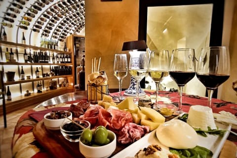 Cover image for the Rome Dinner Food Tasting with Wine Pairing Experience Trastevere experience