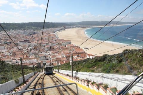 Cover image for the Private Tour to Nazaré and Alcobaça, giant waves and a monastery experience